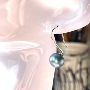 Large Peacock pearl and heavy sterling silver hook earrings.